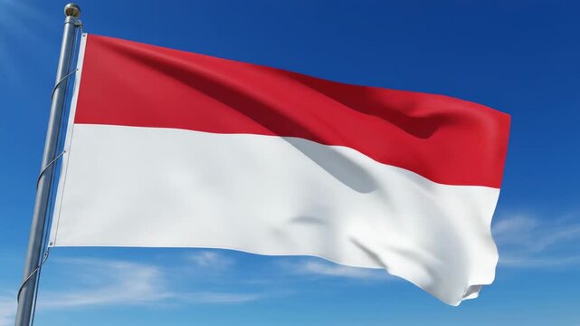 Indonesian flag waving proudly on a flagpole against a clear blue sky, symbolizing national pride and patriotism, perfect for travel and cultural themes