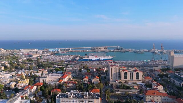 Aerial footage of Haifa's port docks with various container ships. Haifa is the most important hrbor for Israel.