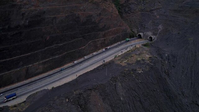Vehicles travel toward Zulam Kot Tunnel on the Swat Kalam Motorway, Khyber Pakhtunkhwa, Pakistan
