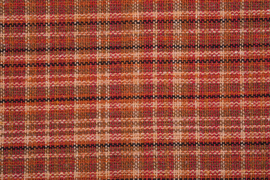Red and brown plaid wool fabric texture