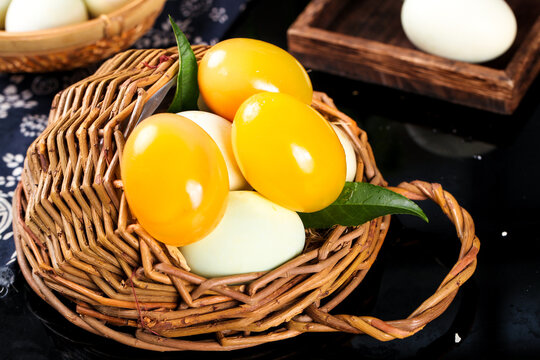 Sichuan Preserved Century Eggs with Yellow Hearts in Wicker Basket - Traditional Chinese Delicacy Food Photography