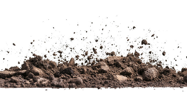 Brown soil pile against a stark black background, details of dirt and debris visible