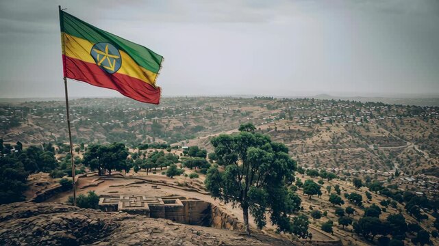 Ethiopia flag waving above the historic Lalibela rock-hewn churches