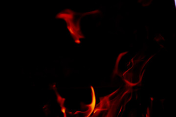 Fototapeta premium Background of the flame in the oven. Overlay layer. Tongues of fire in a fireplace.