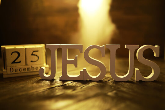 December 25 Christmas Decor with Jesus Sign and Light Bokeh Background