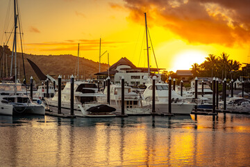 Obraz premium Whitsundays, QLD, Australia - Jun 30, 2026: Hamilton Island marina at sunset