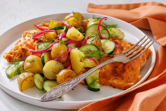 Baked salmon fillet, new potatoes, pickled onion