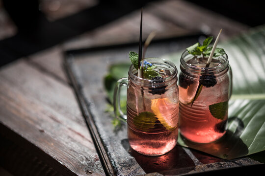 Two fresh ice tea drinks