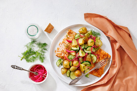 Baked salmon fillet, new potatoes, pickled onion