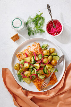 Baked salmon fillet, new potatoes, pickled onion