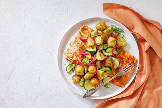 Baked salmon fillet, new potatoes, pickled onion