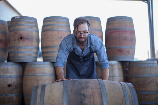 South Africa, Cape Town, cooperage, cooper rolling wine barrel