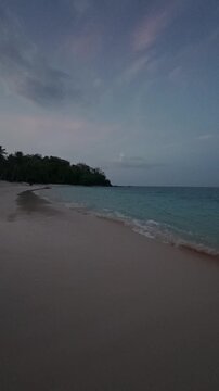 Tranquil Beach Shoreline at Dusk