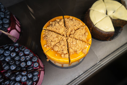 Caramel Crumb Cake In Bakery Display Table View
