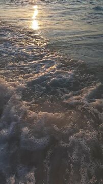 Slow Motion of Ocean Wave Splashing at Sunset