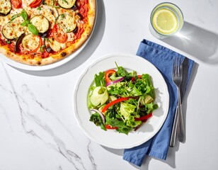 Vegetable pizza and fresh salad Mediterranean lunch, top-down view