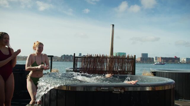 Wellness brings women and friends together for a cold plunge by the harbor
