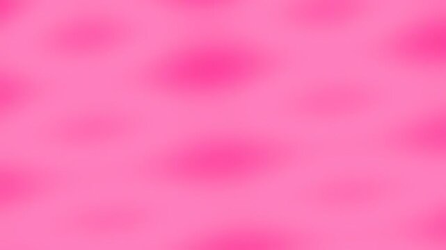 Abstract soft pink background with blurred spots and smooth gradient texture.