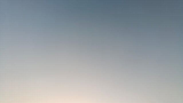 Photography of a Clear Blue Sky Gradient Background, Minimal Natural Sky with Soft Horizon and Copy Space