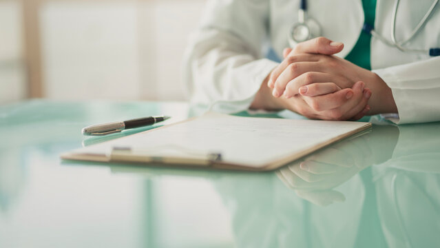 Medical doctor completing administrative healthcare records