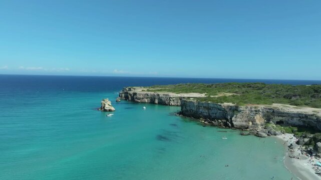 Enchanting beach and cliff, view from above. Puglia, Salento, Italy