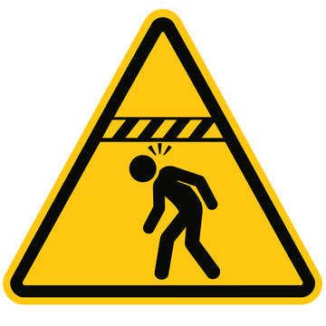 Yellow triangular warning sign for falling objects or low clearance a universal safety symbol for industrial and construction environments