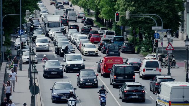 Heavy traffic in Munich, Germany, featuring busy city streets, cars, urban transportation and everyday rush hour in the Bavarian capital