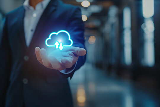 The business person is tapping a virtual screen with cloud icons for uploading to social networks.