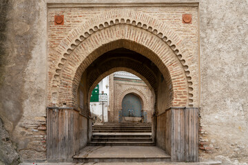 Naklejka premium Double Horseshoe Arch Passage at Bab El-Okla Gate, Tetouan, Morocco