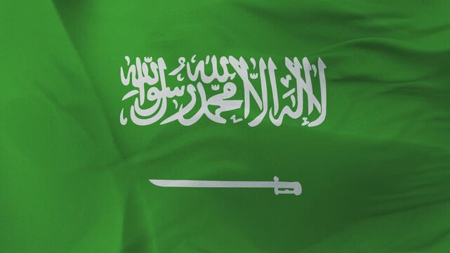Saudi Arabian flag fabric with Arabic script and white sword