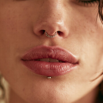 nose and lower lip piercing