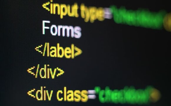 Developer is browsing html code on the computer screen. HTML Web Page Code Scrolling Programming code abstract technology background for software developer and Computer script concept