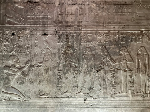 Beautiful bas-reliefs and ancient hieroglyphs in the Temple of Seti I in Abydos, Egypt.