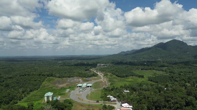 The village serves as a significant entry point through the Biawak ICQS (Immigration, Customs, Quarantine, and Security) Complex. This is a major route for cross-border travel to Aruk in the Sambas.