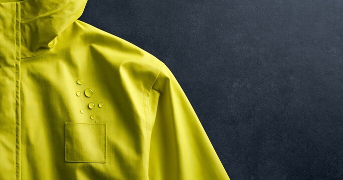 Waterproof yellow rain jacket close-up
