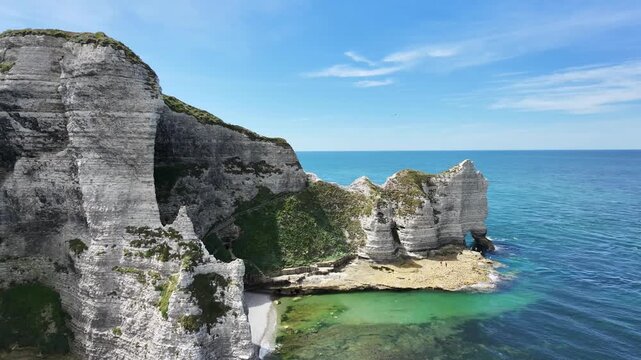Drone flight between the cliffs toward the Elephant Cliff in &Eacute;tretat, France