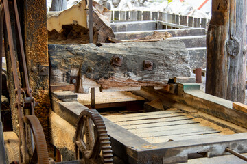 Fototapeta premium Antique Sawmill with a Log