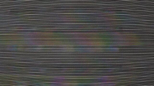 long analog VHS video noise texture with horizontal lines and flickering distortion. The image shows a vintage television screen effect with static, and scanlines.