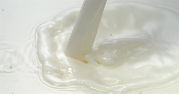 Milk pouring with splash in super slow motion 1000 fps