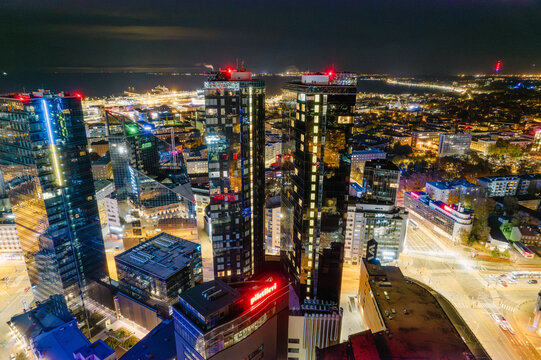 Aerial View of Modern City Skyscrapers at Night
