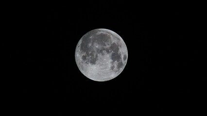 Full Moon in Clear Night Sky with Detailed Lunar Surface © Bhakti