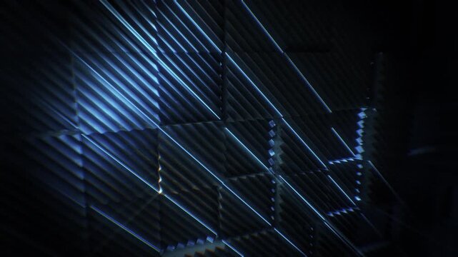 A dark futuristic background loop featuring acoustic tech style panels that move and spin in a random motion.
