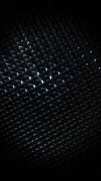 A dark futuristic background loop featuring acoustic tech style panels that move and spin in a random motion.
