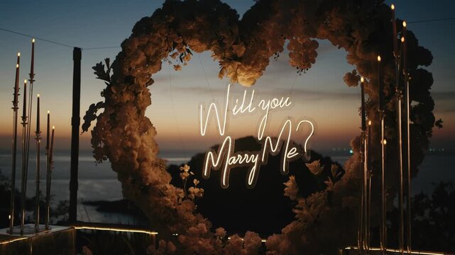 A stunning heart-shaped floral arch with a glowing "Will you marry me?" neon sign at sunset by the sea, capturing the ultimate romantic moment for marriage proposals and engagements.