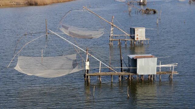 Fishermen's Huts on Bojana River in Ulcinj, Montenegro, Traditional Riverside Landscape Near Adriatic Coast