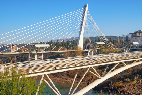 Montenegro, Podgorica city. View of Millennium Bridge and pedestrian Moscow Bridge,  bridges over Moraca River on sunny December day