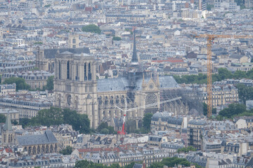 Fototapeta premium Paris, France - 17 May 25: Notre Dame Cathedral and Paris skyline from Montparnasse Tower