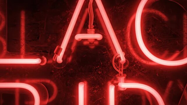 Red neon Black Friday sign glowing on dark background