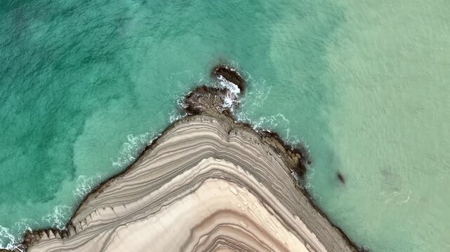 Scala dei Turchi, or the Turkish stairs in Sicily, Italy. Aerial Drone Shot. Unique White Rocks and Turquoise water.