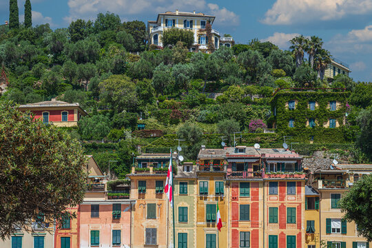 Portofino Square, Province of Genoa, Italy, a tourist attraction. The area is small, but it concentrates pastel-colored buildings, opening onto the sea, chic terraces and a refined Mediterranean air.